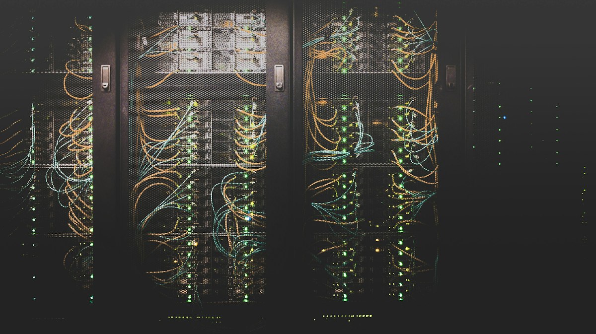 High-density enterprise fiber optic and server infrastructure enclosure